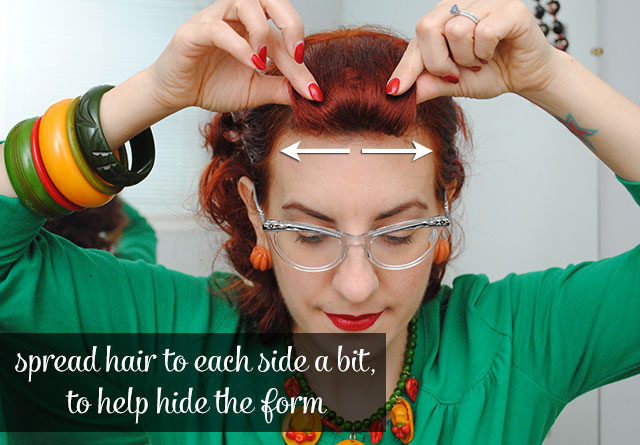 spread hair on roll to hide the form