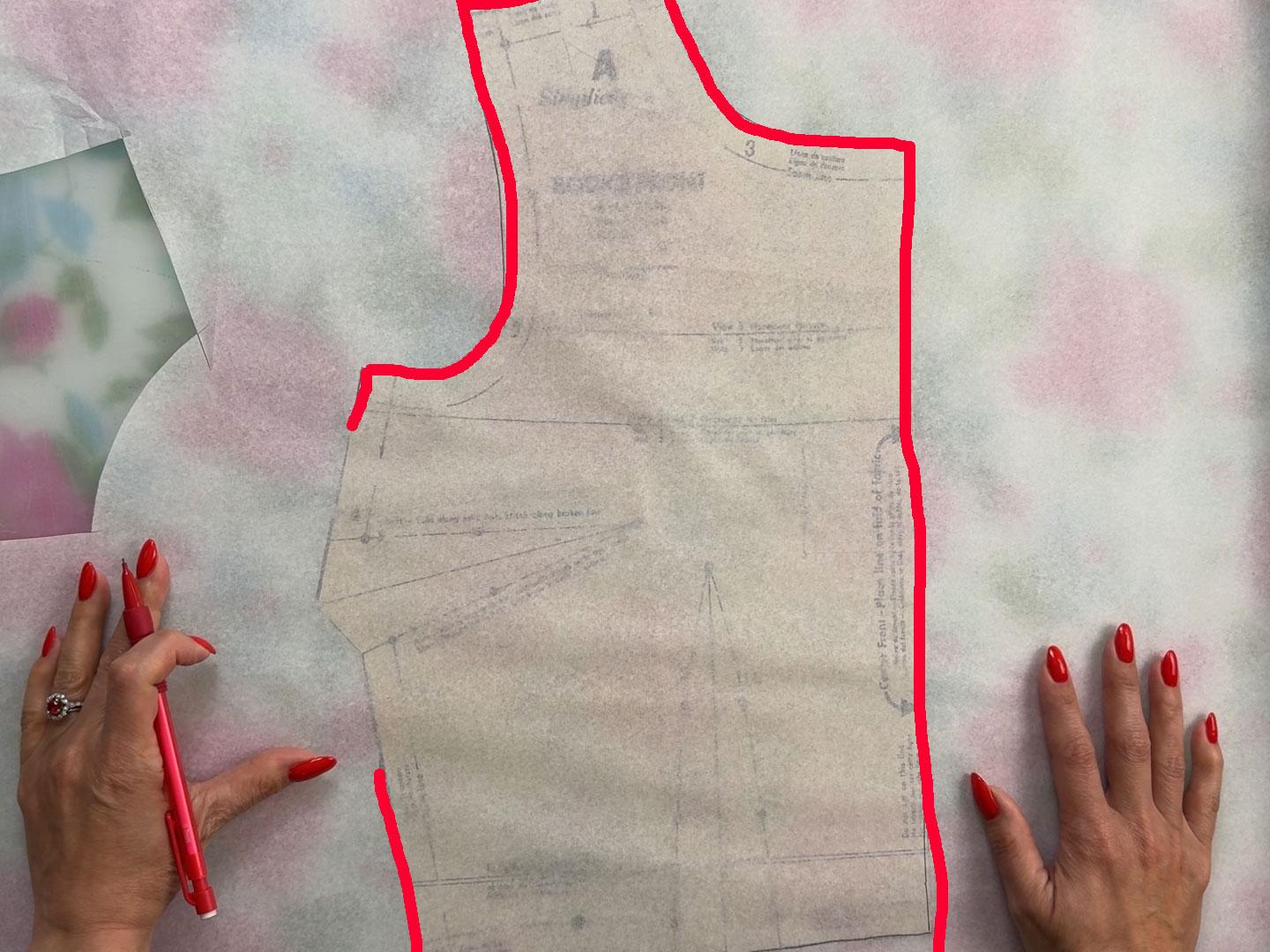 vintage bodice from a sewing pattern under tracing paper
